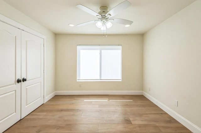 15716 Milne Cir, Moorpark, CA 93021 - unfurnished bedroom with light wood finished floors, a closet, recessed lighting, and a ceiling fan