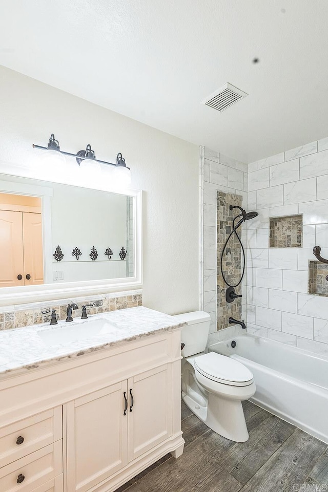 15716 Milne Cir, Moorpark, CA 93021 - full bath with vanity, wood finished floors, and tub / shower combination