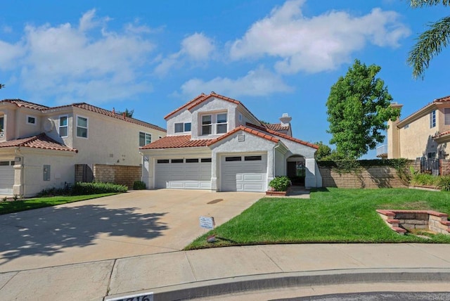 15716 Milne Cir, Moorpark, CA 93021 - mediterranean / spanish-style house featuring a tile roof, driveway, stucco siding, an attached garage, and a front lawn