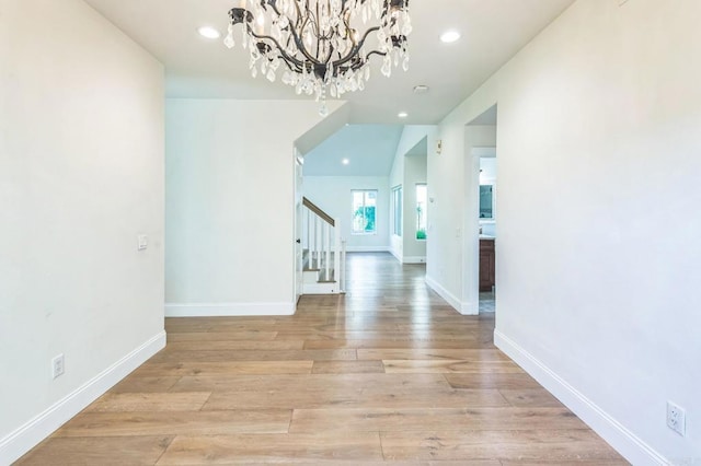 15716 Milne Cir, Moorpark, CA 93021 - corridor with stairway, a chandelier, light wood finished floors, and recessed lighting