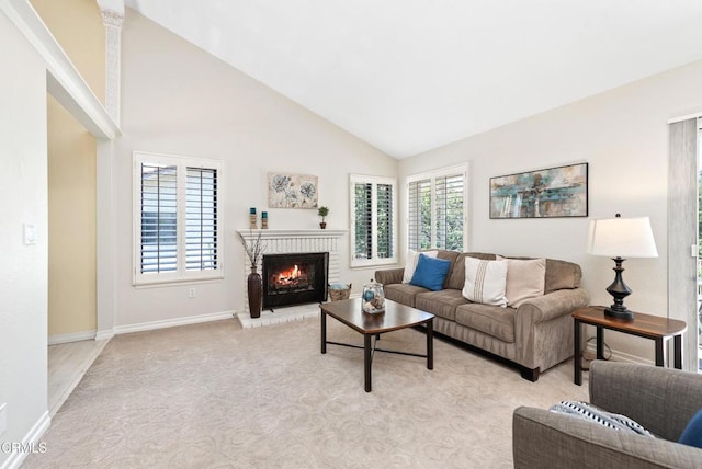 6357 Irena Ave, Camarillo, CA 93012 - living room with a fireplace, high vaulted ceiling, and light colored carpet