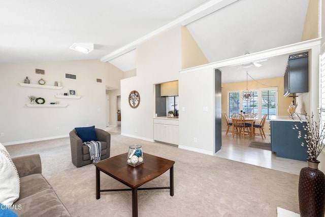 6357 Irena Ave, Camarillo, CA 93012 - living area featuring light carpet, a ceiling fan, and high vaulted ceiling