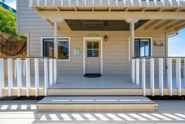 1232 10th St, Los Osos, CA 93402 - doorway to property featuring a porch