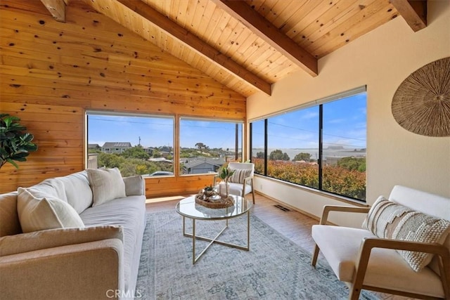 1232 10th St, Los Osos, CA 93402 - living area featuring wooden ceiling, wood finished floors, and wooden walls