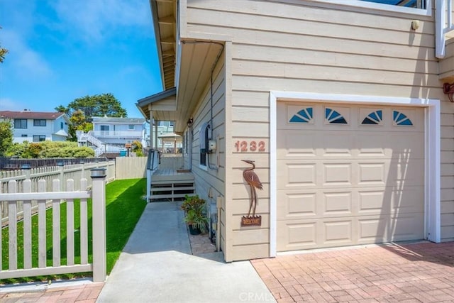 1232 10th St, Los Osos, CA 93402 - garage featuring decorative driveway