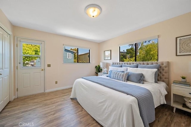 1232 10th St, Los Osos, CA 93402 - bedroom featuring wood finished floors and baseboards