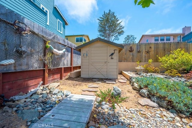 1232 10th St, Los Osos, CA 93402 - fenced backyard featuring a storage unit