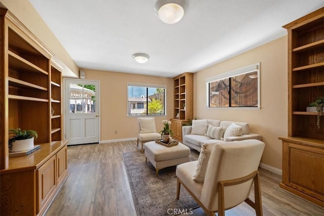 1232 10th St, Los Osos, CA 93402 - living area with wood finished floors and built in shelves