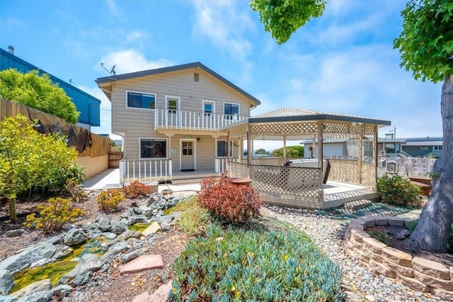 1232 10th St, Los Osos, CA 93402 - back of property with a balcony and a deck