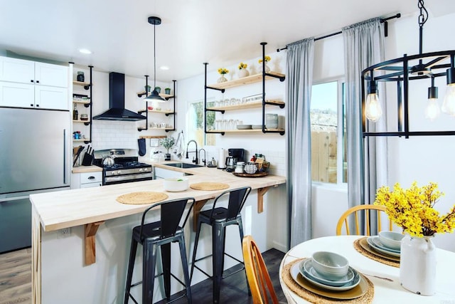 1298 Willowside, Alpine, CA 91901 - kitchen with gas range, refrigerator, open shelves, wall chimney exhaust hood, and recessed lighting