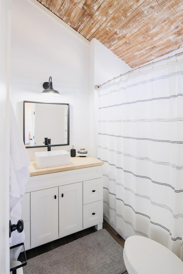 1298 Willowside, Alpine, CA 91901 - full bath with wood ceiling, vanity, wood finished floors, and a shower with shower curtain