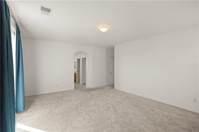 10527 Rose River Falls Ave, Bakersfield, CA 93312 - unfurnished room featuring arched walkways and light colored carpet