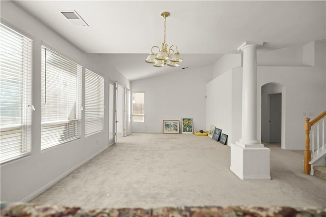 10527 Rose River Falls Ave, Bakersfield, CA 93312 - unfurnished living room featuring decorative columns, carpet, and healthy amount of natural light