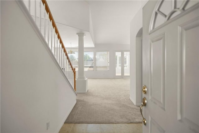 10527 Rose River Falls Ave, Bakersfield, CA 93312 - foyer with carpet, stairway, and decorative columns