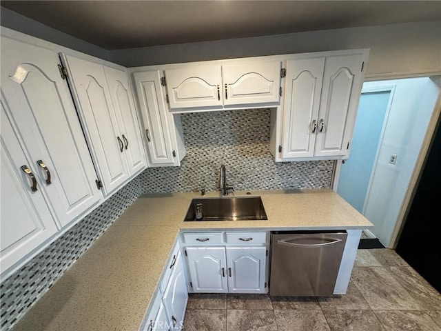 4021 York Blvd, Glassell Park, CA 90065 - kitchen with stainless steel dishwasher, light countertops, white cabinets, and tasteful backsplash