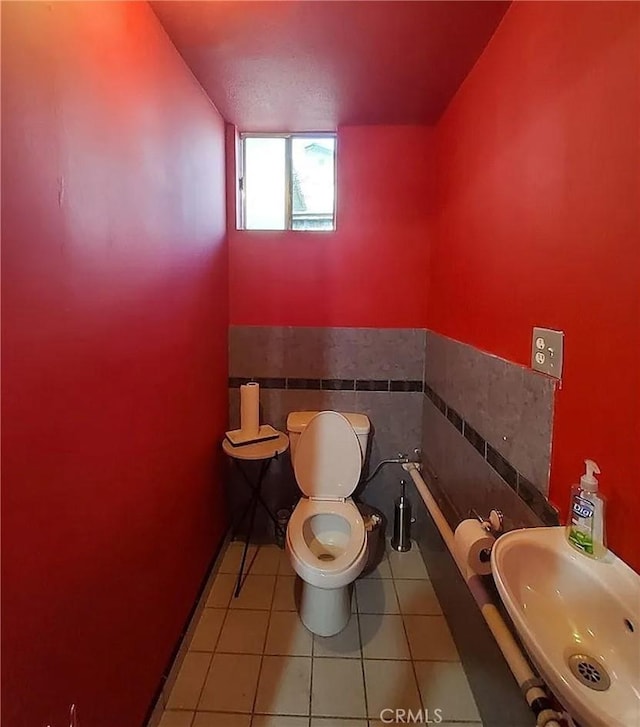 4021 York Blvd, Glassell Park, CA 90065 - bathroom featuring tile patterned floors, tile walls, and wainscoting