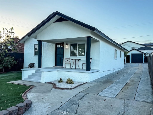 4021 York Blvd, Glassell Park, CA 90065 - view of front of property featuring a porch, a shed, and stucco siding