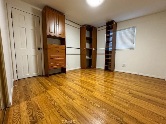 4021 York Blvd, Glassell Park, CA 90065 - unfurnished bedroom with light wood finished floors and baseboards