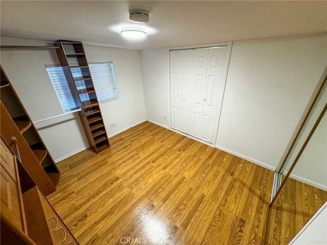 4021 York Blvd, Glassell Park, CA 90065 - unfurnished bedroom with wood finished floors and a closet