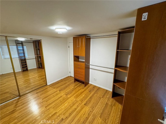 4021 York Blvd, Glassell Park, CA 90065 - unfurnished bedroom with light wood-style floors and a closet