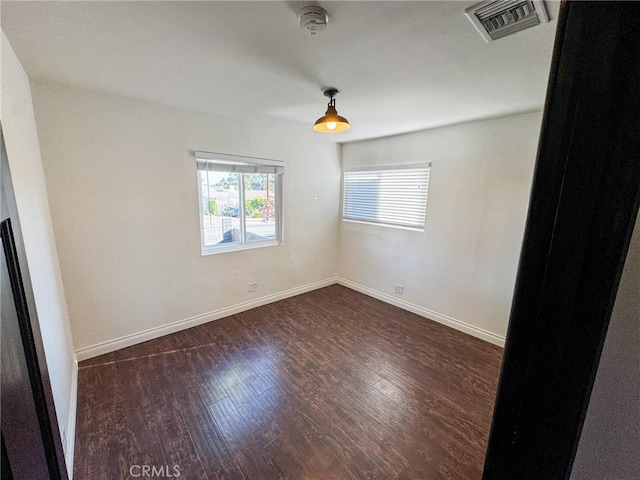 4021 York Blvd, Glassell Park, CA 90065 - empty room with a smoke detector and dark wood-style floors