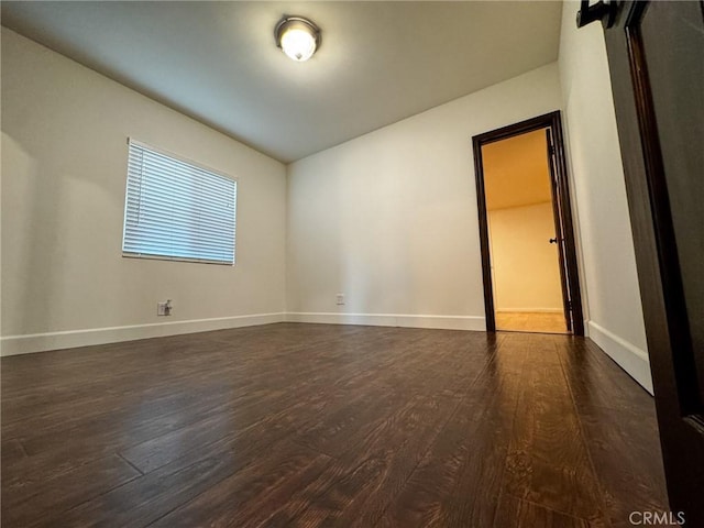4021 York Blvd, Glassell Park, CA 90065 - spare room featuring dark wood-style flooring and baseboards