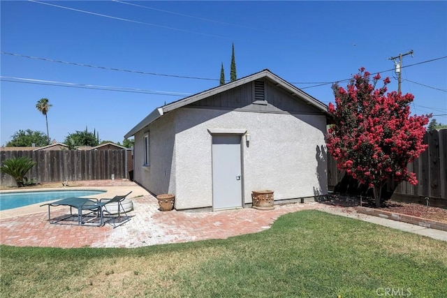 1721 Myrtlewood Dr, Ceres, CA 95307 - rear view of house featuring a fenced backyard, a patio, and stucco siding