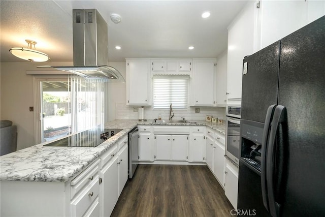 1721 Myrtlewood Dr, Ceres, CA 95307 - kitchen with black appliances, island range hood, a peninsula, decorative backsplash, and dark wood-style flooring