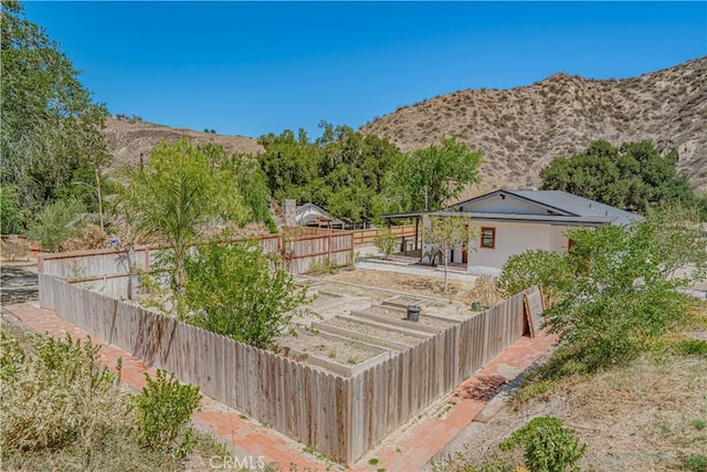 29701 Jackson St, Castaic, CA 91384 - fenced backyard featuring a garden and a mountain view