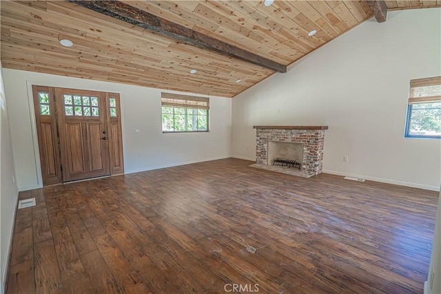 29701 Jackson St, Castaic, CA 91384 - unfurnished living room featuring wood-type flooring, a brick fireplace, and wood ceiling