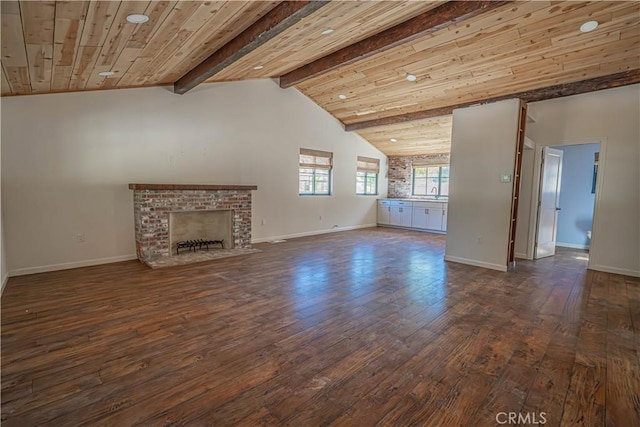 29701 Jackson St, Castaic, CA 91384 - unfurnished living room featuring hardwood / wood-style floors, a brick fireplace, and wooden ceiling