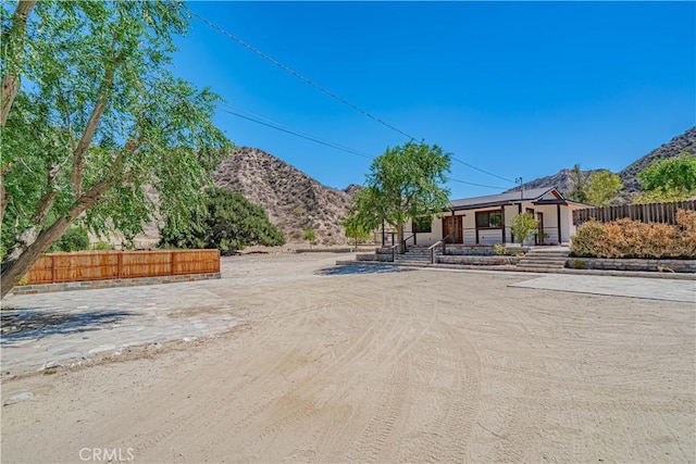 29701 Jackson St, Castaic, CA 91384 - view of dirt / gravel road featuring a mountain view