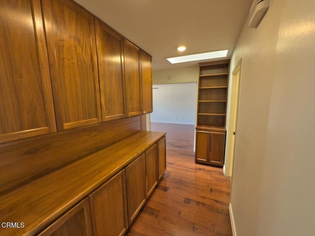 37134 Village 37, Camarillo, CA 93012 - corridor featuring a skylight, dark wood finished floors, and recessed lighting
