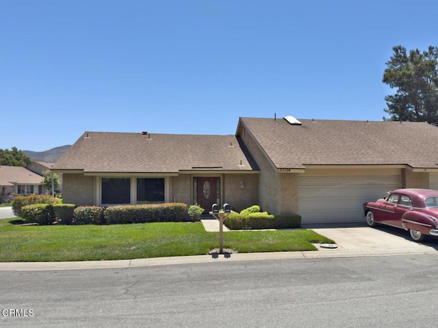 37134 Village 37, Camarillo, CA 93012 - single story home with an attached garage, concrete driveway, a front yard, and stucco siding