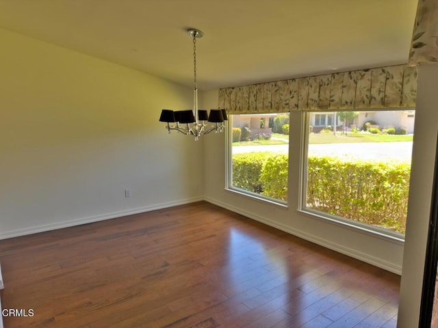37134 Village 37, Camarillo, CA 93012 - unfurnished dining area featuring a chandelier and wood finished floors