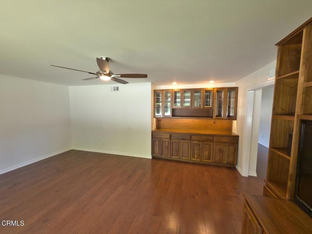 37134 Village 37, Camarillo, CA 93012 - unfurnished living room with dark wood-type flooring, ceiling fan, and recessed lighting