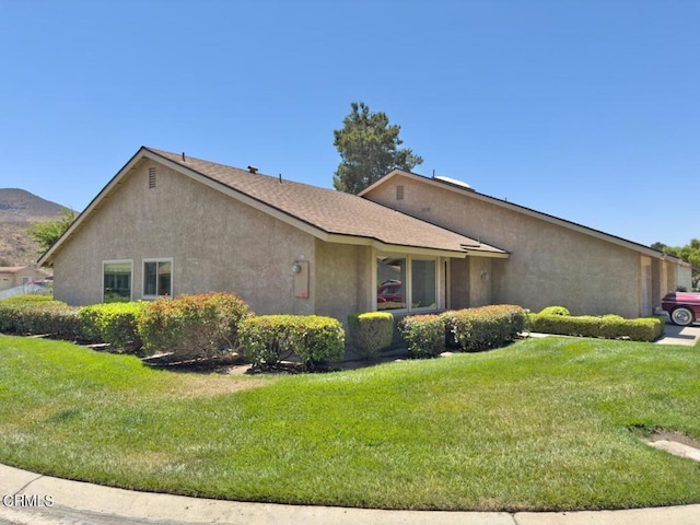 37134 Village 37, Camarillo, CA 93012 - view of home's exterior with stucco siding and a yard