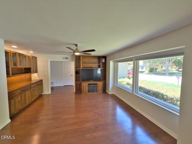 37134 Village 37, Camarillo, CA 93012 - unfurnished living room with dark wood-style flooring, ceiling fan, and recessed lighting