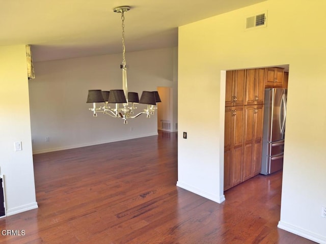 37134 Village 37, Camarillo, CA 93012 - unfurnished dining area featuring a chandelier, dark wood finished floors, and lofted ceiling