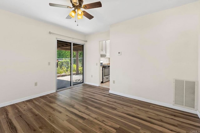 1523 Temple Heights Dr, Oceanside, CA 92056 - unfurnished living room featuring ceiling fan and dark wood finished floors
