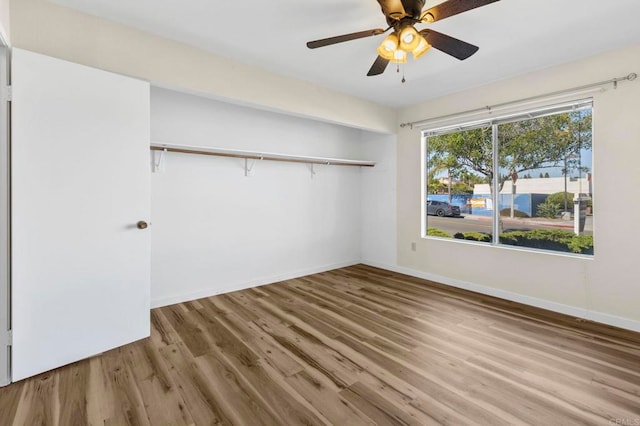 1523 Temple Heights Dr, Oceanside, CA 92056 - unfurnished bedroom with wood finished floors, a closet, and a ceiling fan