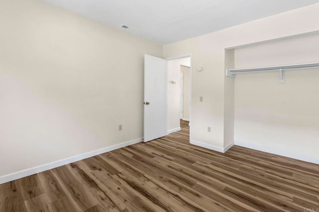 1523 Temple Heights Dr, Oceanside, CA 92056 - unfurnished bedroom with wood finished floors and a closet