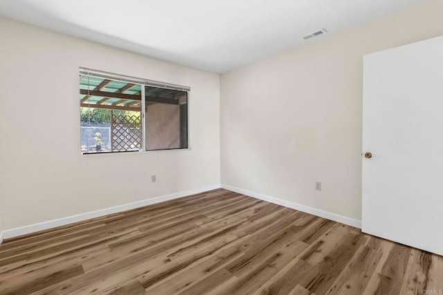 1523 Temple Heights Dr, Oceanside, CA 92056 - spare room featuring wood finished floors and baseboards