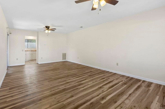 1523 Temple Heights Dr, Oceanside, CA 92056 - spare room with ceiling fan and wood finished floors
