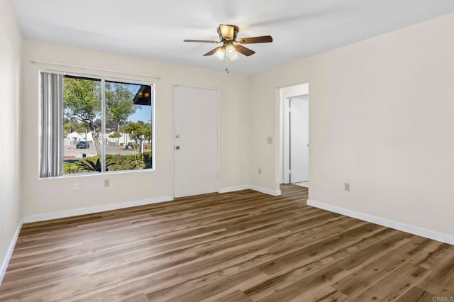 1523 Temple Heights Dr, Oceanside, CA 92056 - empty room featuring wood finished floors and ceiling fan