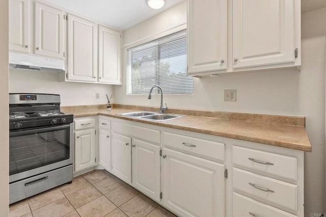 1523 Temple Heights Dr, Oceanside, CA 92056 - kitchen featuring stainless steel gas range oven, under cabinet range hood, and white cabinets