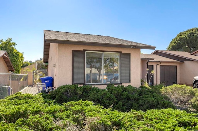 1523 Temple Heights Dr, Oceanside, CA 92056 - view of side of property featuring stucco siding