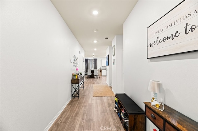 27555 Mountainside St, Menifee, CA 92584 - hallway featuring light wood-style floors and recessed lighting