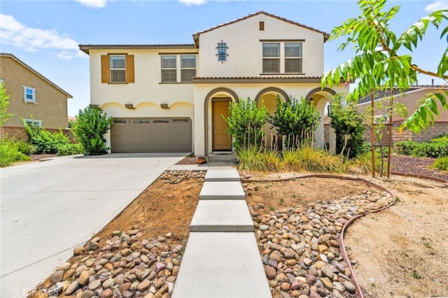 27555 Mountainside St, Menifee, CA 92584 - mediterranean / spanish-style house featuring concrete driveway, stucco siding, an attached garage, and a tiled roof