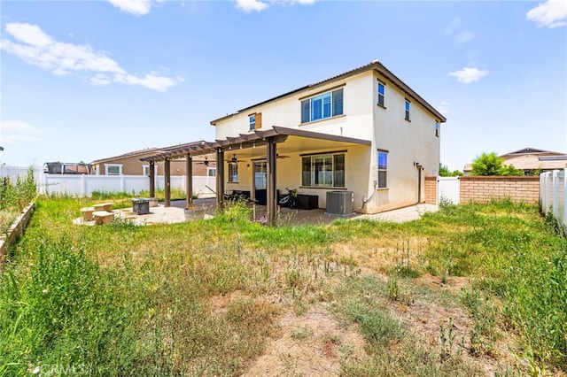27555 Mountainside St, Menifee, CA 92584 - back of property featuring a ceiling fan, a patio, stucco siding, and a fenced backyard